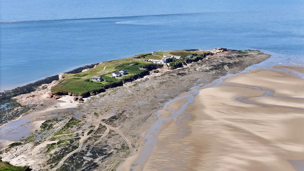 Hilbre Island seen across the Dee Estuary